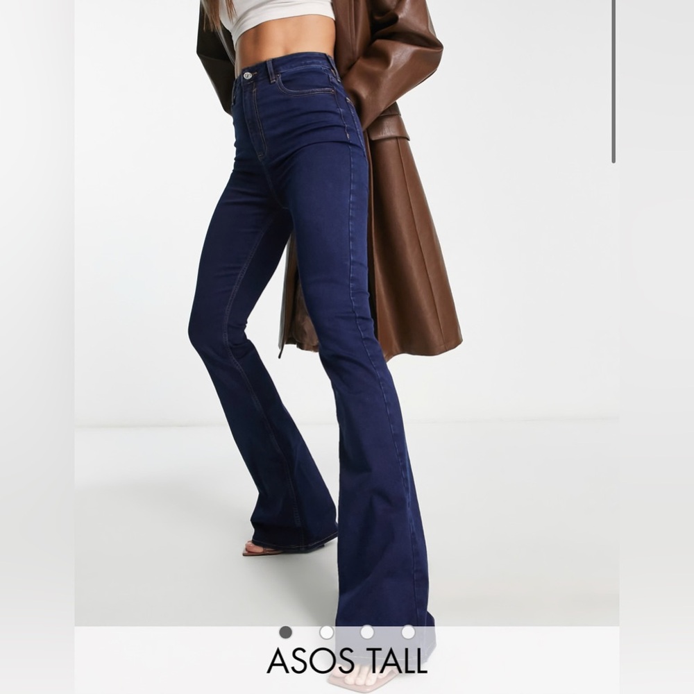 ASOS DESIGN TALL power stretch flared jeans in dark blue
